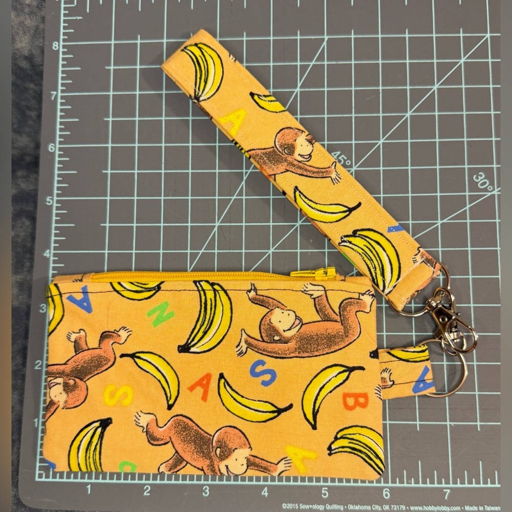 Curious George Banana Print Kids Wristlet